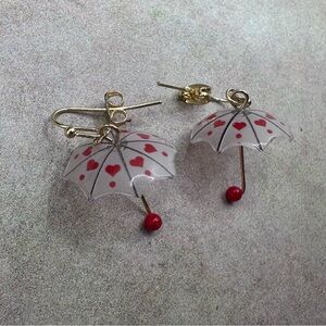 Handmade umbrella earrings with little red hearts